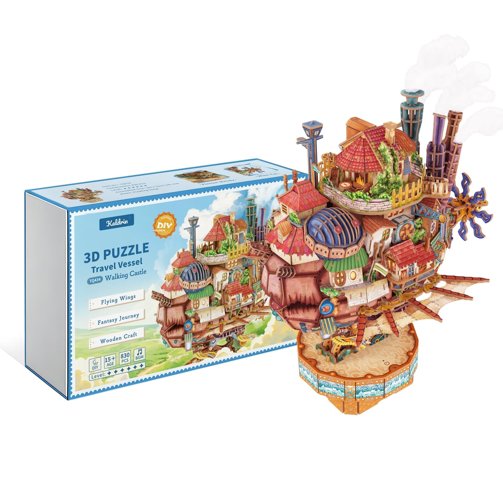 Moving Castle completed model beside its illustrated box